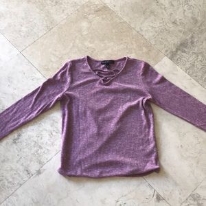 A purple sweater